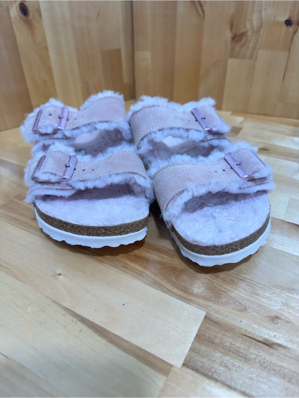 Birkenstock Arizona Shearling Suede Leather Sandals in the color Light Rose